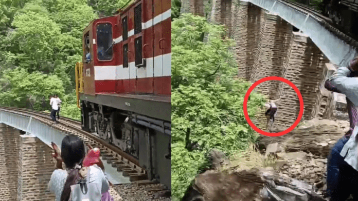 रील बनाने के चक्कर में बुरा फंसा कपल, ट्रेन को आता देख 140 फीट ऊंचे पुल से लगाई छलांग, फिर हुआ चमत्कार रील बनाने के चक्कर में बुरा फंसा कपल, ट्रेन को आता देख 140 फीट ऊंचे पुल से लगाई छलांग, फिर हुआ चमत्कार