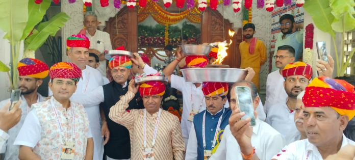 Flag hoisting was done on the temple peak on the 13th anniversary of Neelkanth Mahadev Temple Binny Mill Flag hoisting was done on the temple peak on the 13th anniversary of Neelkanth Mahadev Temple Binny Mill